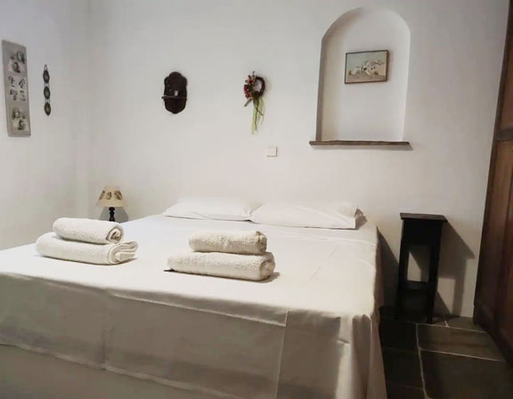 The master bedroom of the Villa Vathi in Sifnos